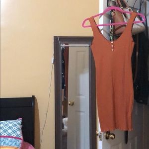 Burnt orange mini dress.